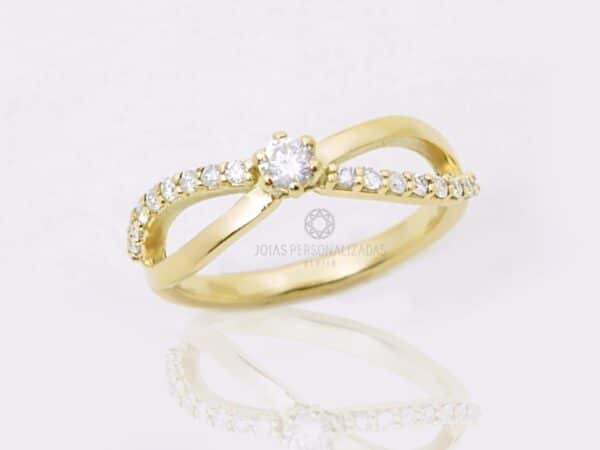 anel em ouro 18k com brilhantes e símbolo do infinito